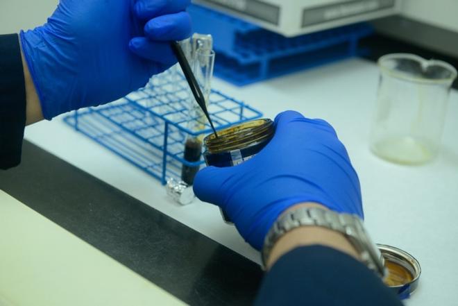 An oil sample is tested at the Coast Guard Marine Safety Lab in New London, Connecticut, Friday, May 19, 2017. Any oil sheens or spills should be reported to the Coast Guard National Response Center at 1-800-424-8802. ©  Nicole J. Groll